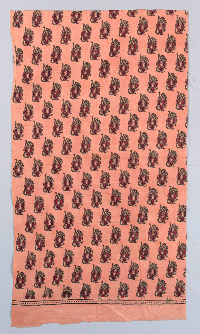 Block printed cotton with small scattered motifs