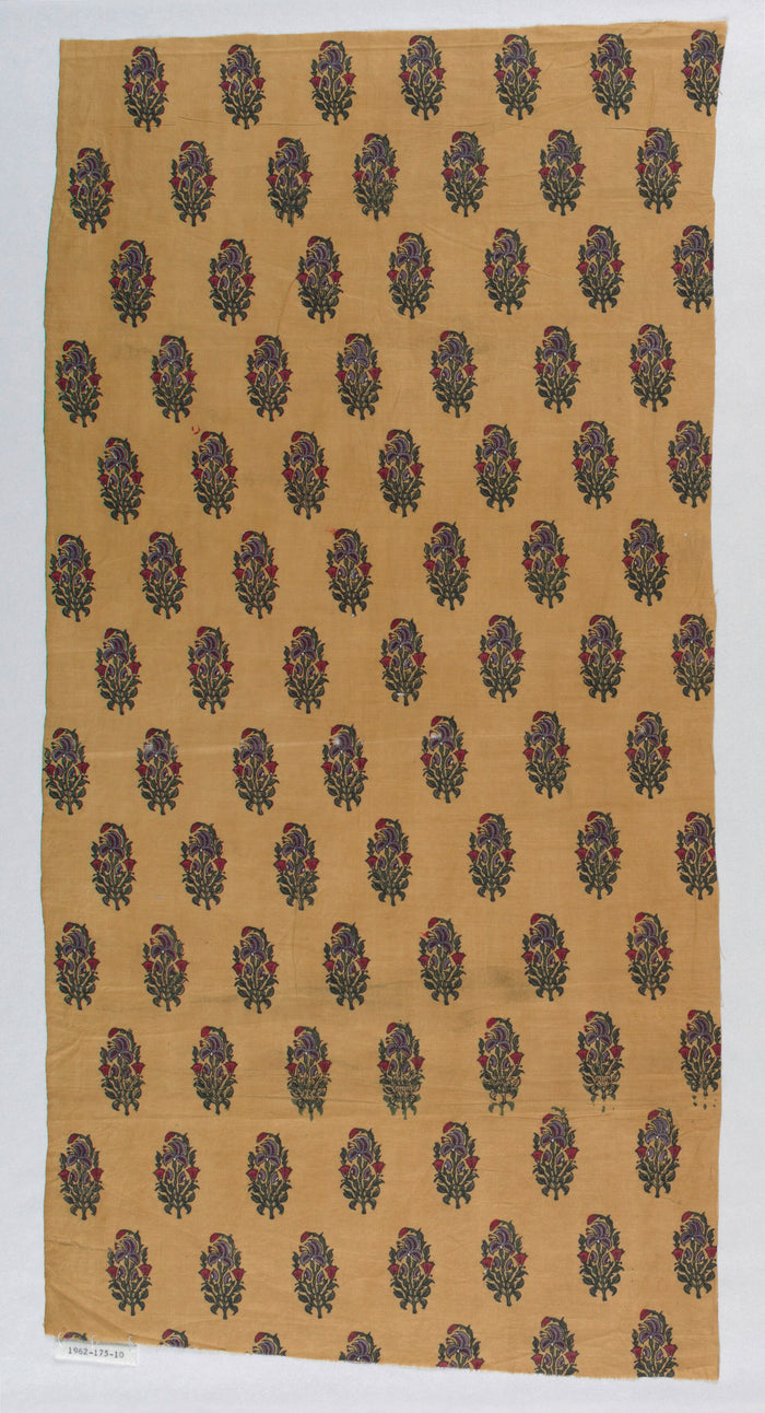 Block printed cotton with large repeated flower motifs