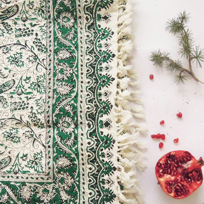 Hand block printed textile with a creeper border