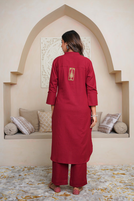 MAROON COTTON FLAX KURTA WITH PANTS , EMBELISHED WITH HAND WORK BUTTONS AND PATCH