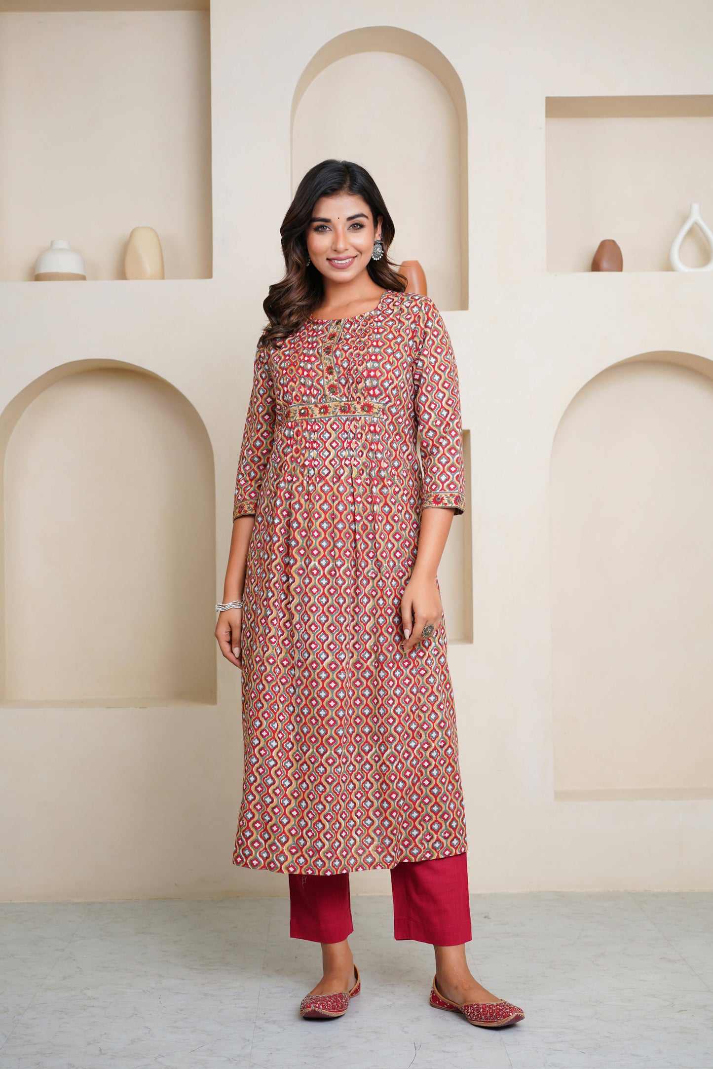 RED HAND BLOCK PRINTED KURTA EMBELISHED WITH MIRROR EMBROIDERY AND PIN TUCKS