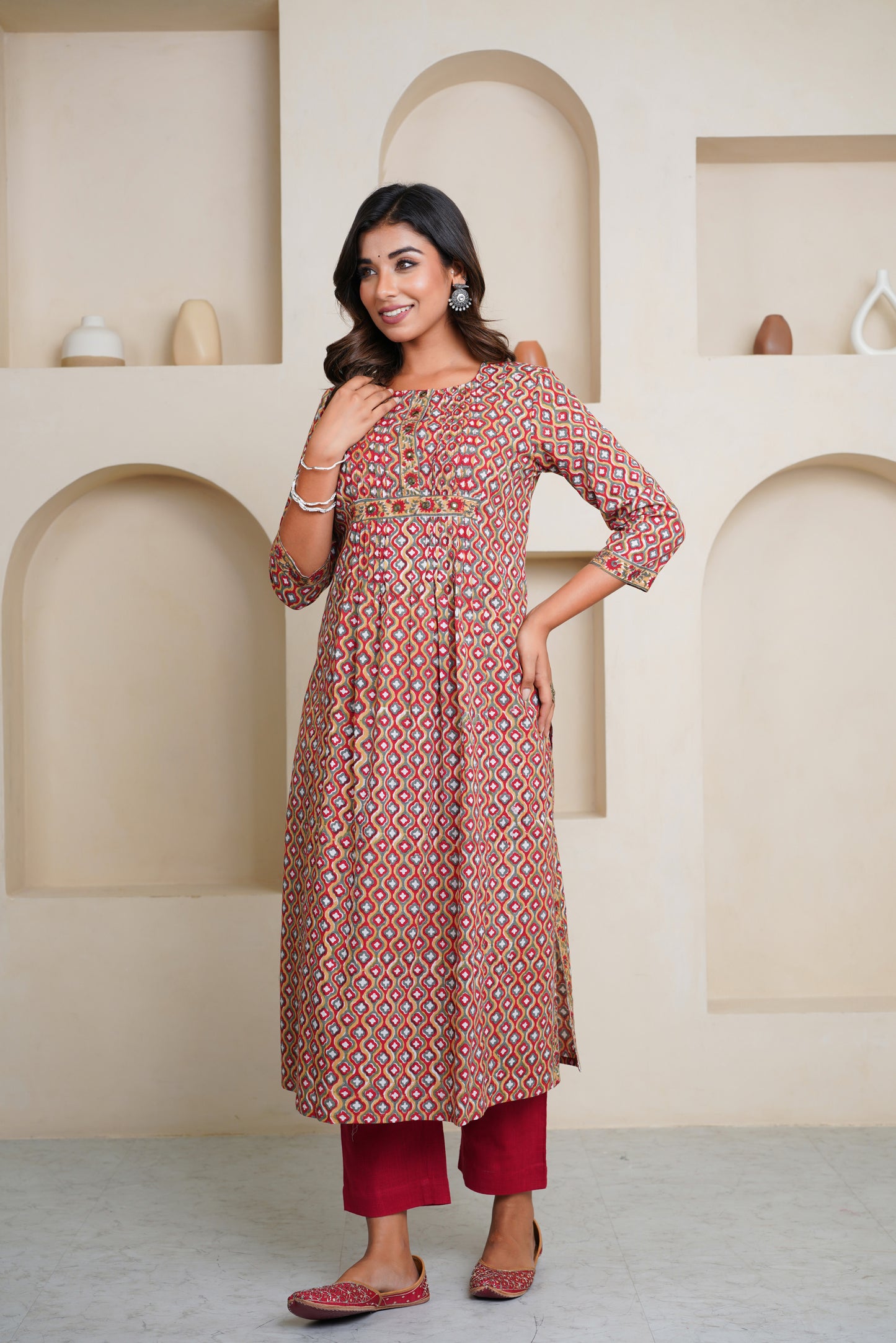 RED HAND BLOCK PRINTED KURTA EMBELISHED WITH MIRROR EMBROIDERY AND PIN TUCKS